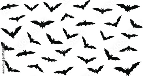 Set of black vector silhouettes of flying bats isolated on white background for halloween spooky party decoration and design element.