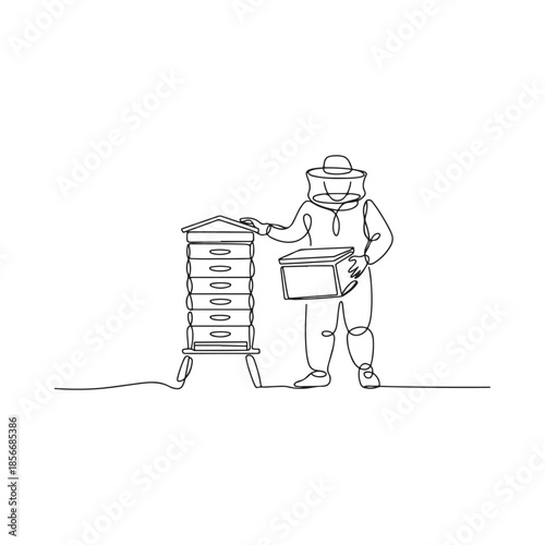 A beekeeper tending to beehives with a protective suit and equipment
