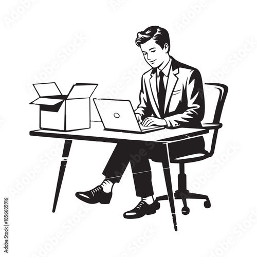 A businessman working on a laptop with an open box nearby