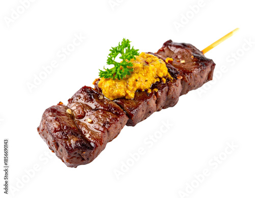 Delicious Beef Skewer with Mustard and Parsley.