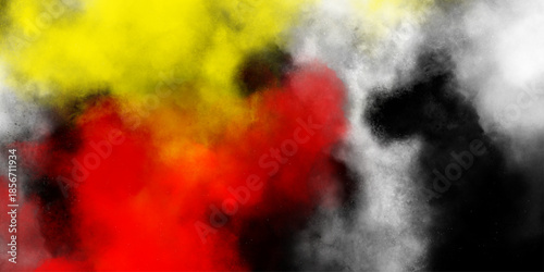 Abstract powder splatted background. multicolor powder explosion on black background. Multicolor powder explosion on black background. Colored cloud. Colorful dust explode. Paint Holi.