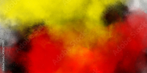 Abstract powder splatted background. multicolor powder explosion on black background. Multicolor powder explosion on black background. Colored cloud. Colorful dust explode. Paint Holi.