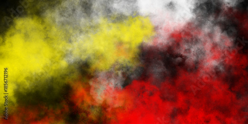 Abstract powder splatted background. multicolor powder explosion on black background. Multicolor powder explosion on black background. Colored cloud. Colorful dust explode. Paint Holi.