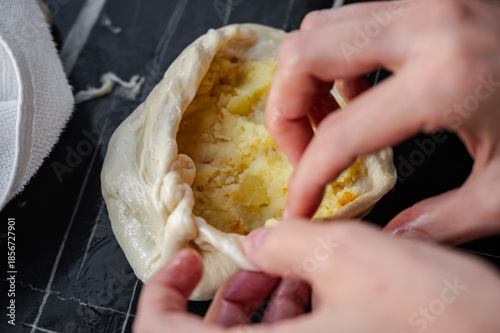 Hand Shaping Fried Pies with Savory Potato and Fried Onion Filling