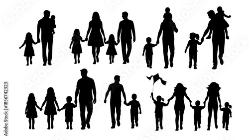 happy family silhouettes walking together holding hands outdoors under bright daylight sun