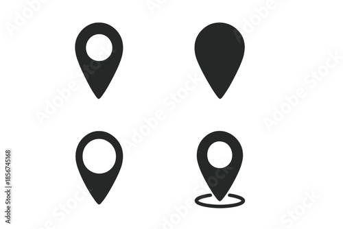Collection of four dark map pin icons