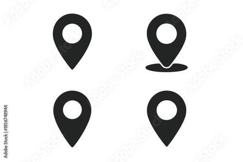 Four dark map location pointers on a gray background