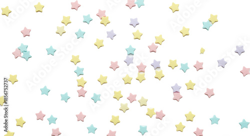 Miniature pastel star confetti (sky blue, pink, yellow, lavender) scattered precisely on a transparent background, clean flat lay for celebratory design element