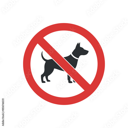 A striking red prohibition sign clearly depicts a black silhouette of a dog indicating that dogs are not allowed in this area