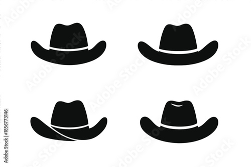 Four Cowboy Hats Silhouettes on Dark Background