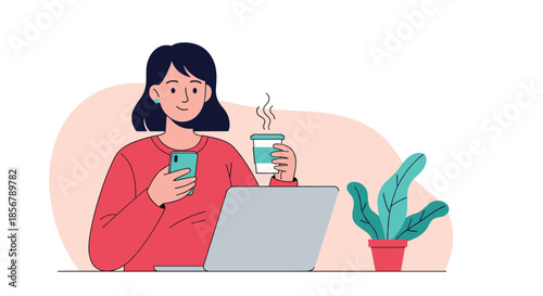 A smiling young woman works on her laptop while holding a smartphone and a cup of coffee, enjoying a productive moment.