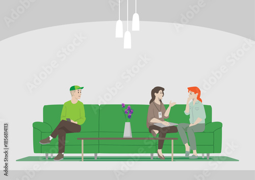 Man overheard Women Talking while Relaxing on a Green Couch in Waiting Room