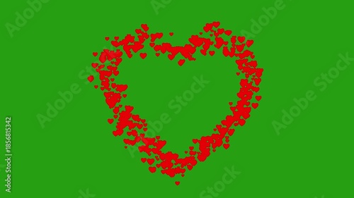 Sparkling heart shape particle animation on green screen for chroma key use. Ideal for love, romance, Valentine, wedding visuals, overlays and motion graphics.