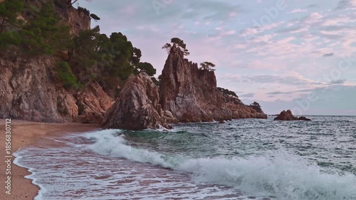 Morning at the coastline of the sea (sunrise at Costa Brava, Spain, Catalunya, El Golfet)