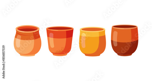 Collection of four ceramic cups in warm earthy tones and varied shapes