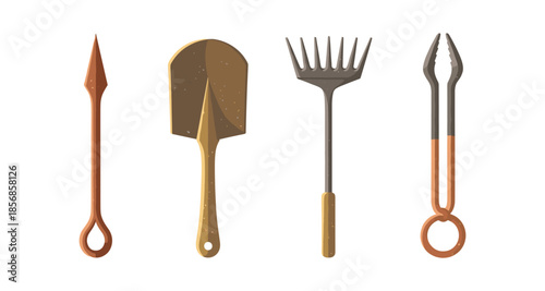 Set of four garden and barbecue tools including a spear, shovel, rake, and tongs