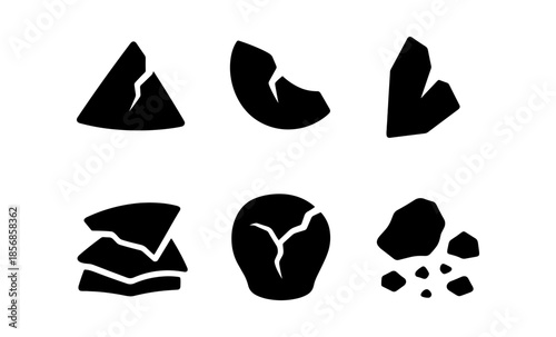 Collection of cracked and broken abstract shapes and rock fragments