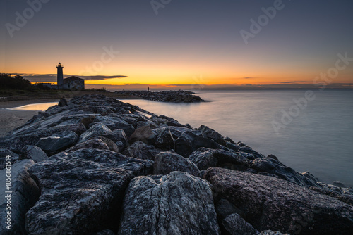 summer sunrise over the bibione lighthouse, Bibione, San Michele al Tagliammento, Venice, Italy
