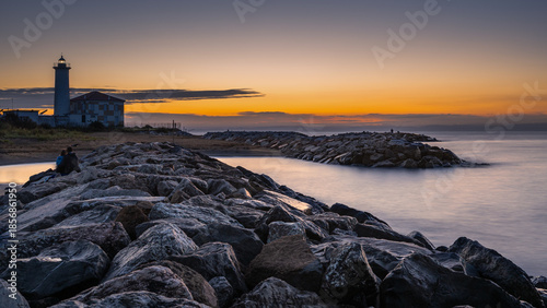 summer sunrise over the bibione lighthouse, Bibione, San Michele al Tagliammento, Venice, Italy