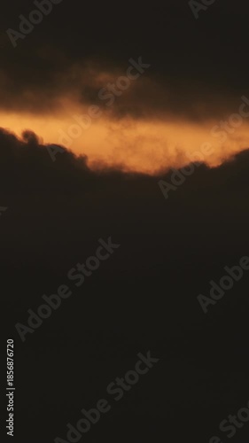 Clouds at sunset. Time Lapse. 4K Vertical