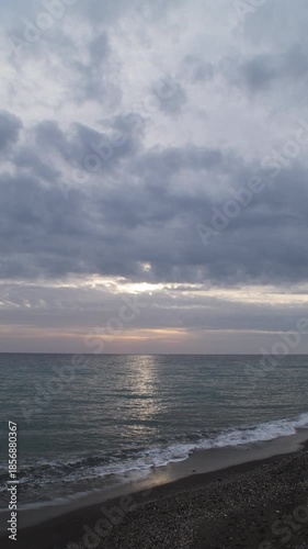 Beach at sunset. 4K Vertical