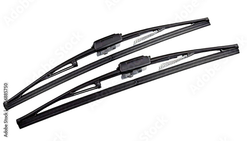 Two dark grey car windshield wiper blades, with angled diagonally on a, isolated on a transp 