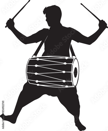 Dynamic drummer playing double sided Indian drum