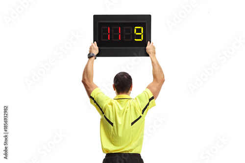 фотографія Rear view shot of a football referee with a substitute board