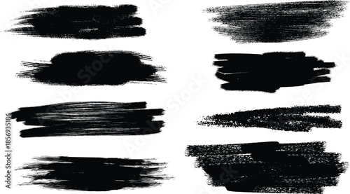 A collection of eight black ink brush strokes on a white background