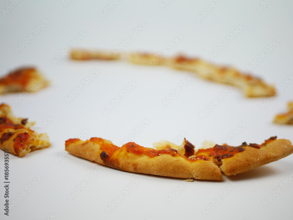 custom made wallpaper toronto digitalPizza Crust Pieces Forming Circular Shape on White Background Representing Leftovers Minimal Food Styling and Eating Concept