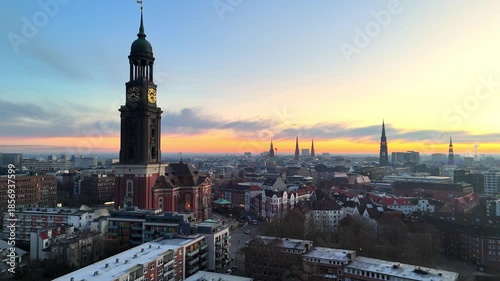 Aerial drone video (forward flight) of the famous St. Michaelis Church at sunrise in Hamburg