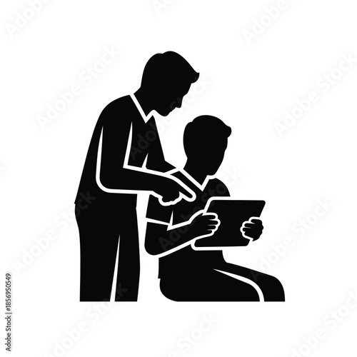 Teacher assisting student with tablet