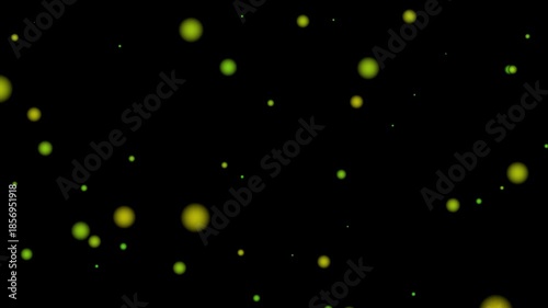 A dark background with scattered glowing green and yellow circular lights creating a bokeh effect