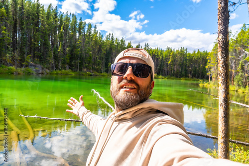 Εκτύπωση καμβά Tourist enjoying breathtaking view of herbert lake in banff national park