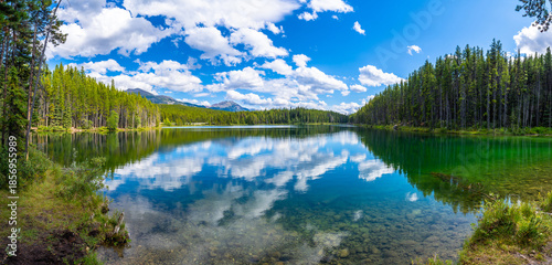Photography Panoramic view of herbert lake reflecting clouds in banff national park