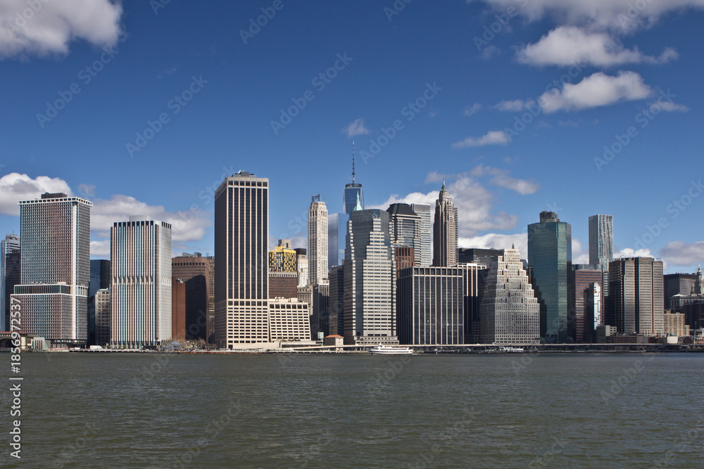 Fototapeta premium Lower Manhattan Skyline taken from Brooklyn partly cloudy day