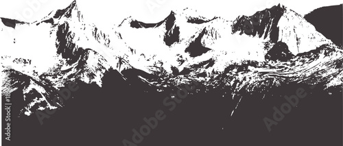 Snow capped mountain range silhouette in black and