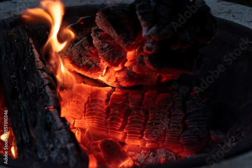 warm and cozy close up of red flames in a wood fire