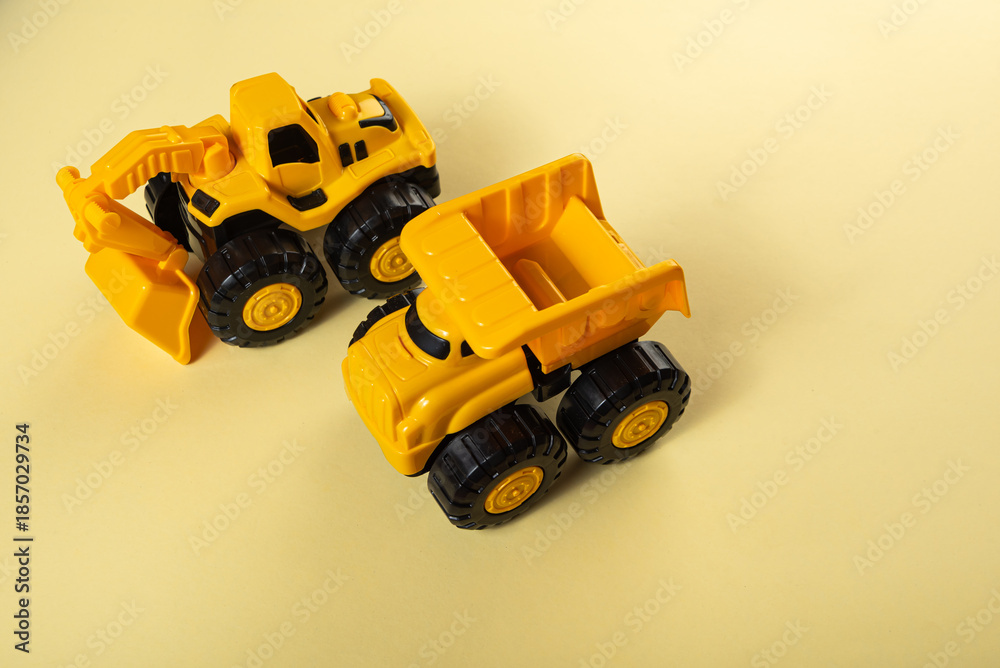 Fototapeta premium Colorful toys on a yellow background