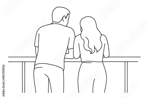 Couple leaning on a railing, seen from behind, enjoying a moment together