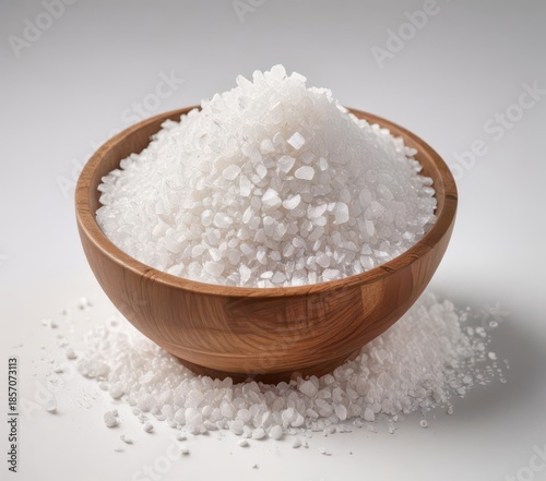 Crystalline sea salt in a wooden bowl on white background isolated for emphasis,  wood,  decorative,  crystals