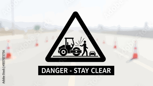 Road construction warning sign with a roller, worker, and car, advising 'DANGER - STAY CLEAR' on a blurred road with cones.