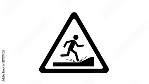 Warning sign depicting a person in a hard hat falling down a flight of stairs, indicating a trip hazard on a yellow background.