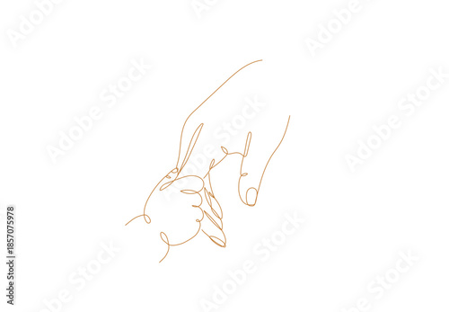 The baby's hand holds the mother's finger lovingly