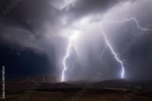 Lightning bolt strike illuminates the sky during a storm in Arizona
