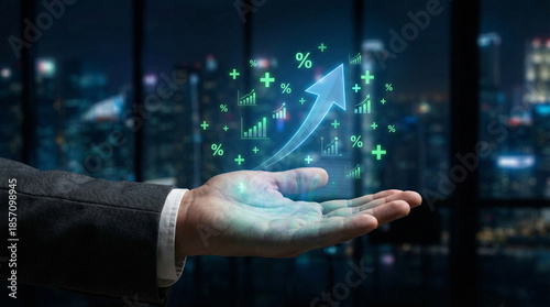 Businessman's hand holding a glowing upward arrow, percentage signs, and charts over a city night background, symbolizing business growth and financial success