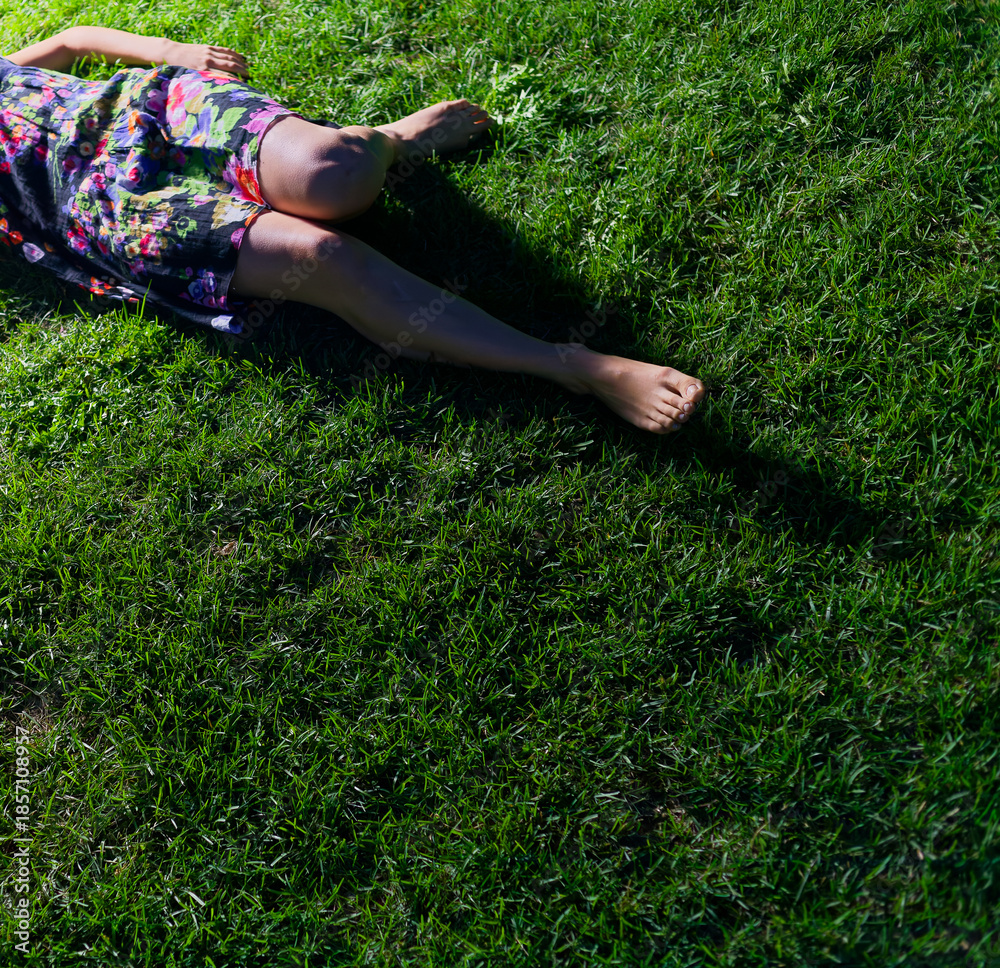 custom made wallpaper toronto digitalLeisure Outside: Woman in Colourful Dress Relaxing Barefoot on Green Lawn Under Sunshine, Vertical Shot Copyspace