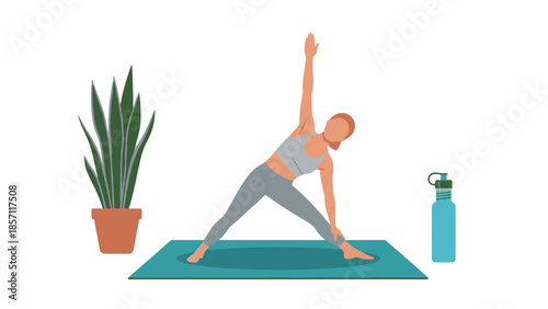 Young Woman Practicing Triangle Yoga Pose on Mat, Promoting Fitness and Healthy Lifestyle