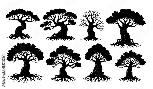 Ancient fantasy tree silhouettes vector set with twisted trunks and dramatic branches