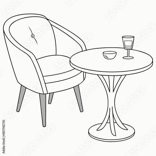 Comfortable armchair beside a round table